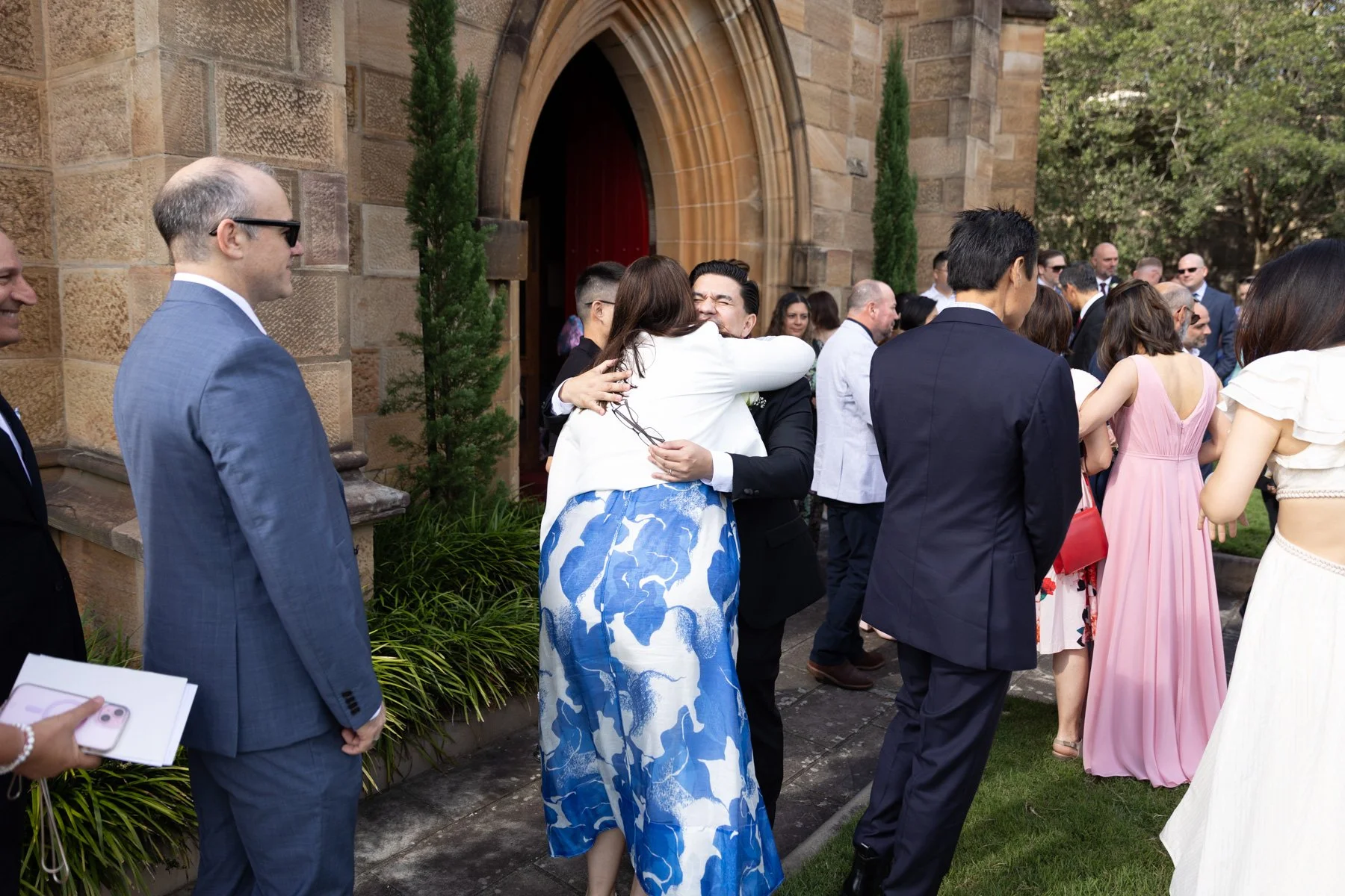 Wedding guests congratulations outside The Garrison Church, Millers Point, Sydney