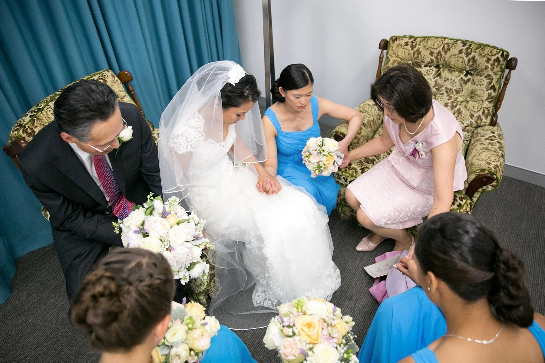 Brides parents and bridesmaids praying before ceremony at St Barnabas Broadway Ultimo Sydney wedding