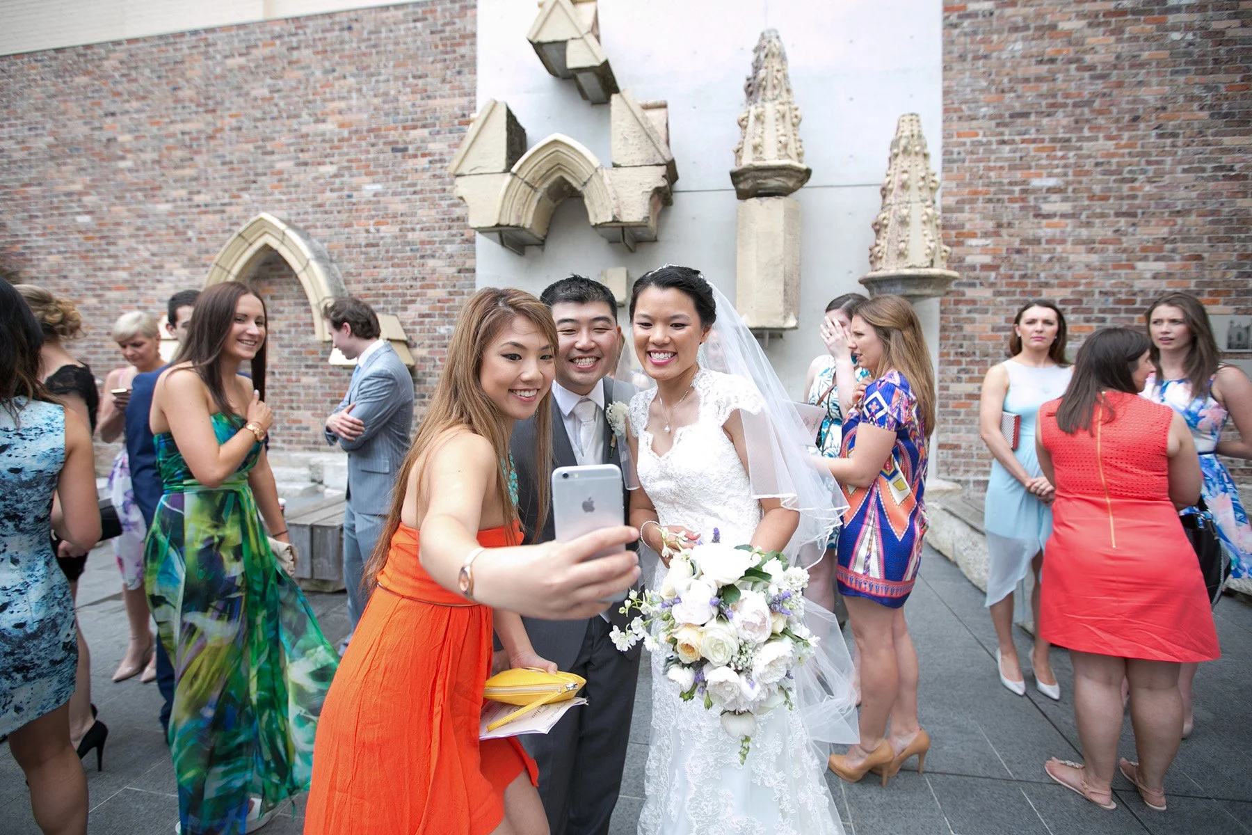 Bride couple selfie with guests St Barnabas Broadway courtyard Ultimo Sydney 