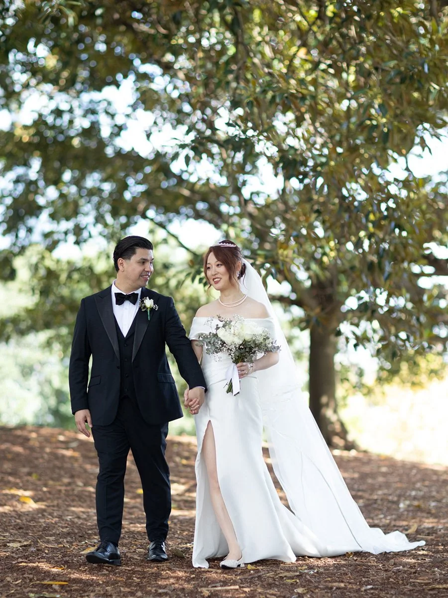 Couple beneath the autumn canopy, Observatory Hill, Sydney