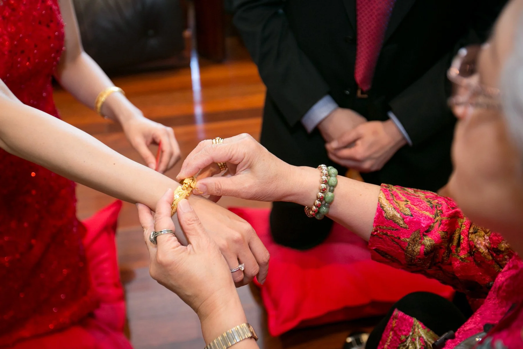 Gold bracelet gifted during Chinese tea ceremony, Sydney wedding