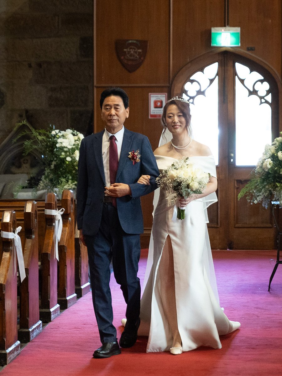 Bride walks down the aisle with her father, Garrison Church, Millers Point