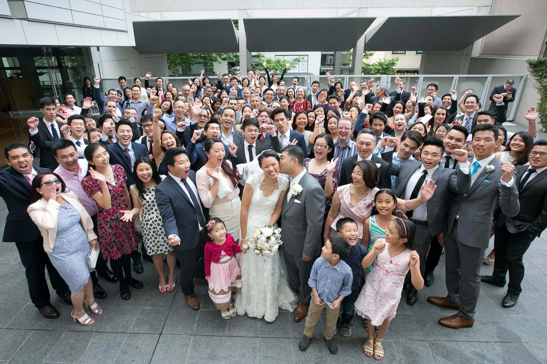 Wedding group photo outside St Barnabas Broadway courtyard Ultimo Sydney