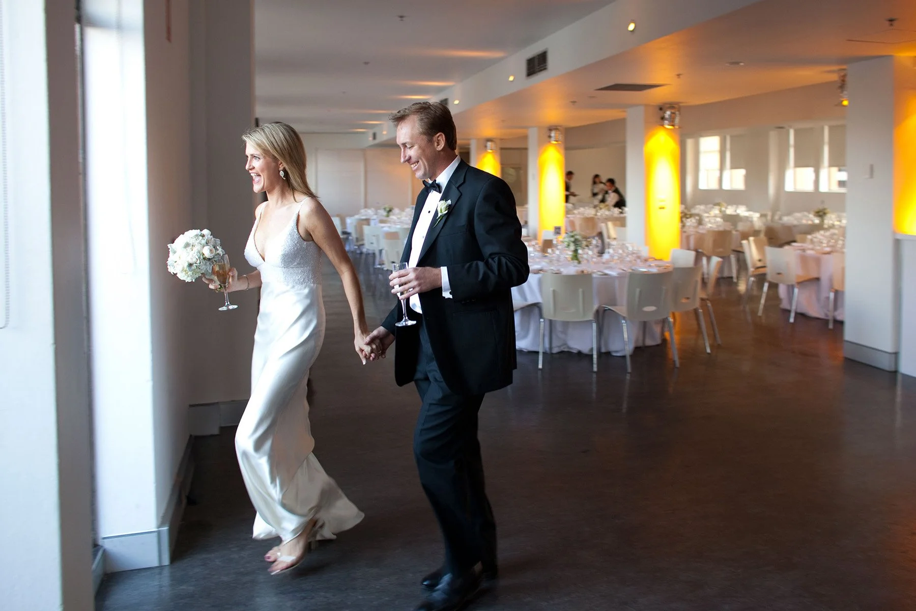 Bride and groom walking into their reception at the Museum of Contemporary Art Sydney