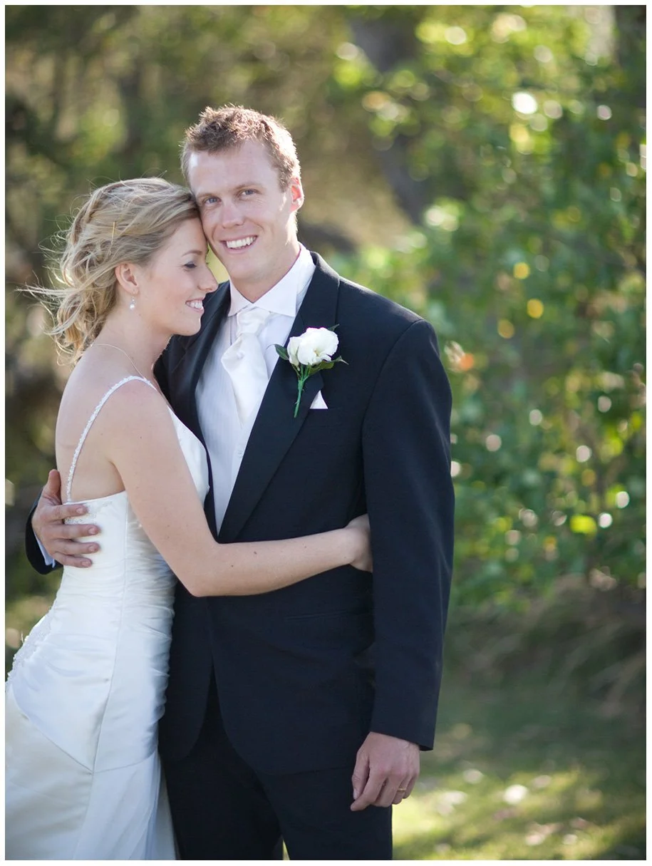 bride hugging groom balmoral beach portrait