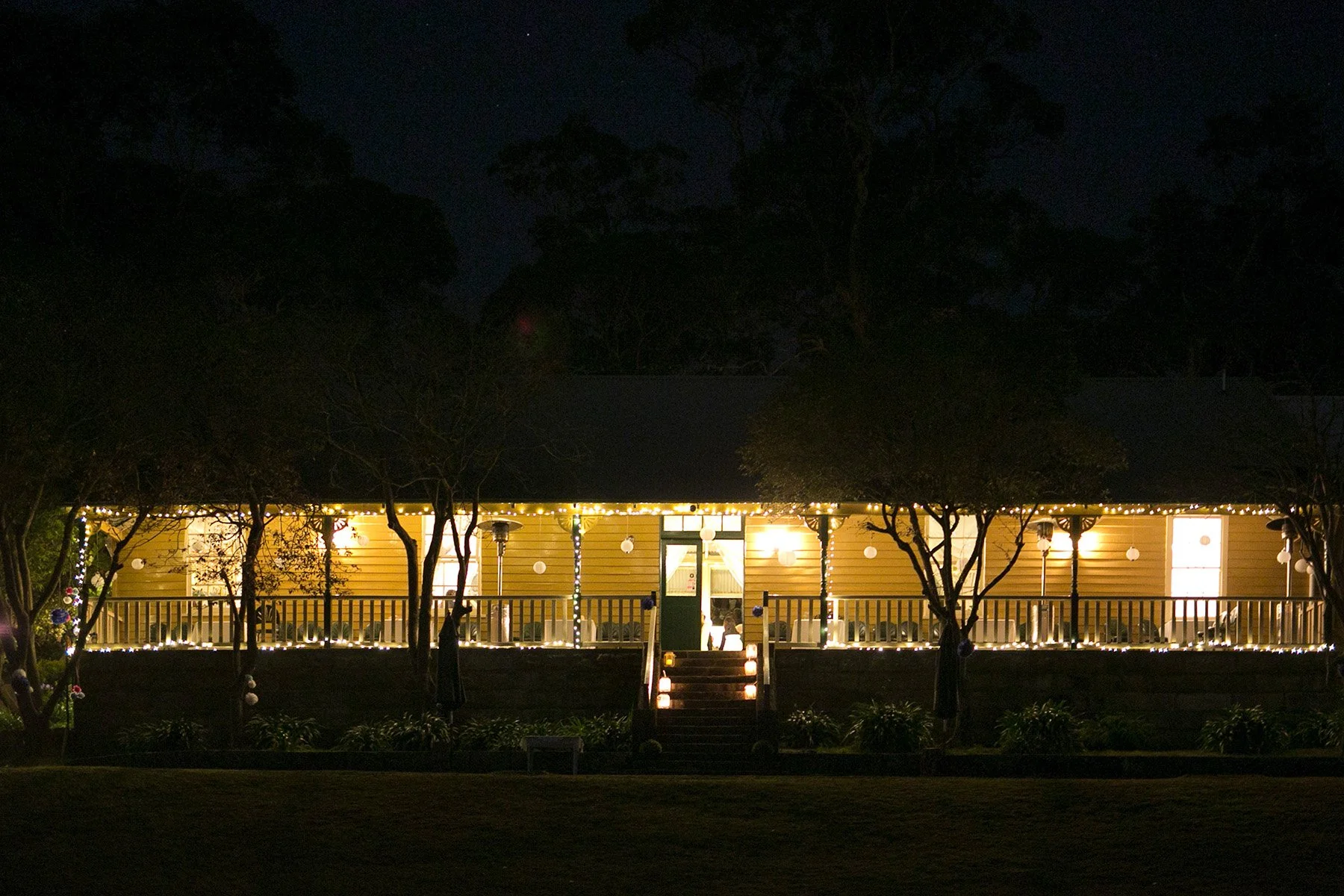 Athol Hall Mosman exterior lit up at night during the wedding reception