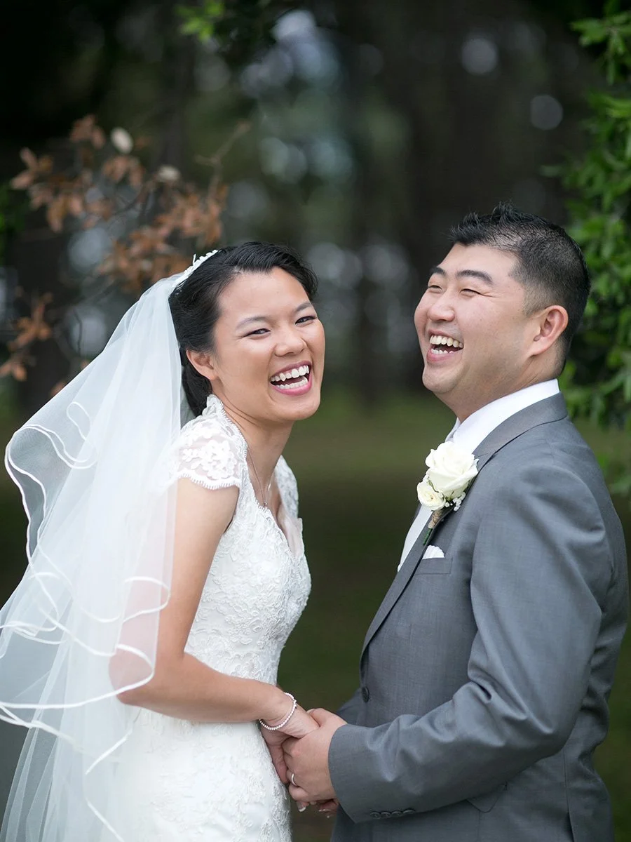 Bride and groom laughing wedding portrait Centennial Park Sydney bridal photos