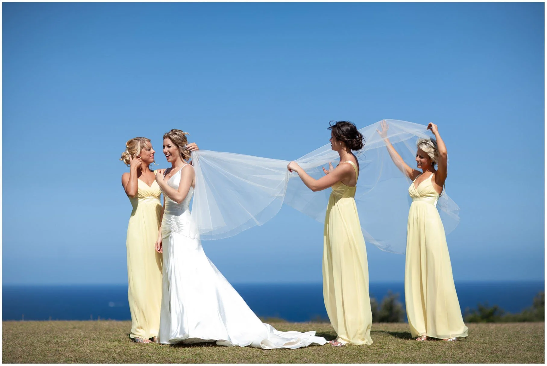 Bridesmaids assisting with veil during portraits, Vaucluse Sydney