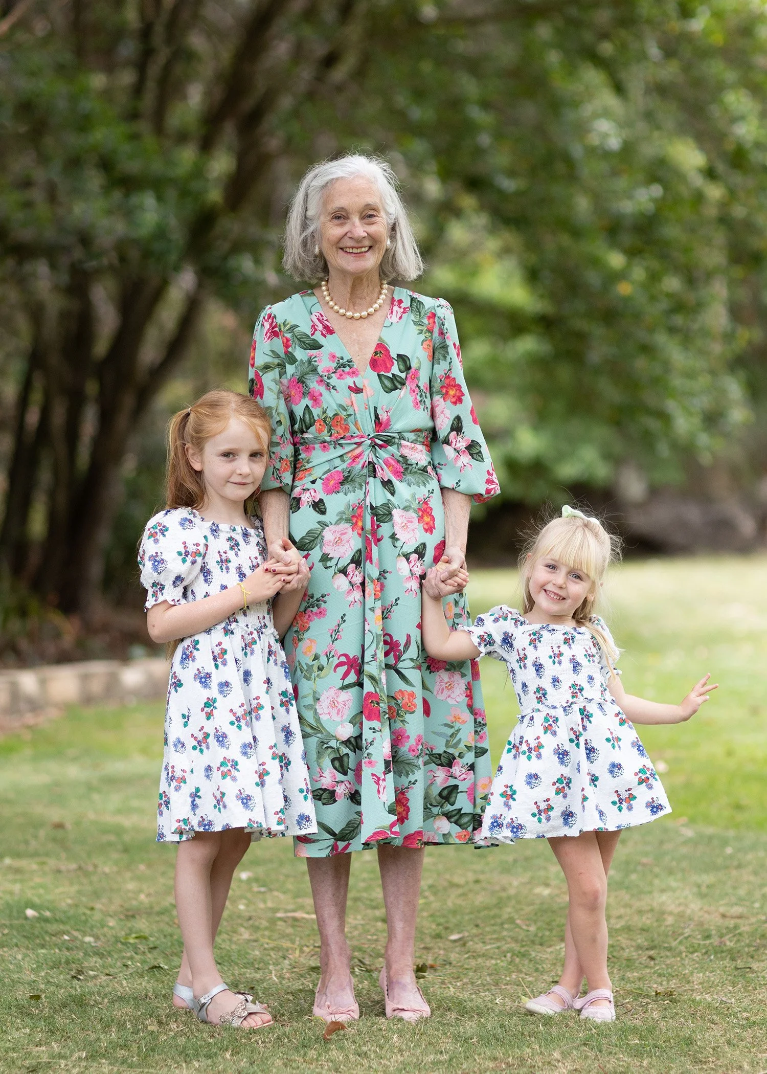 grandmother-with-granddaughters-in-park.jpg