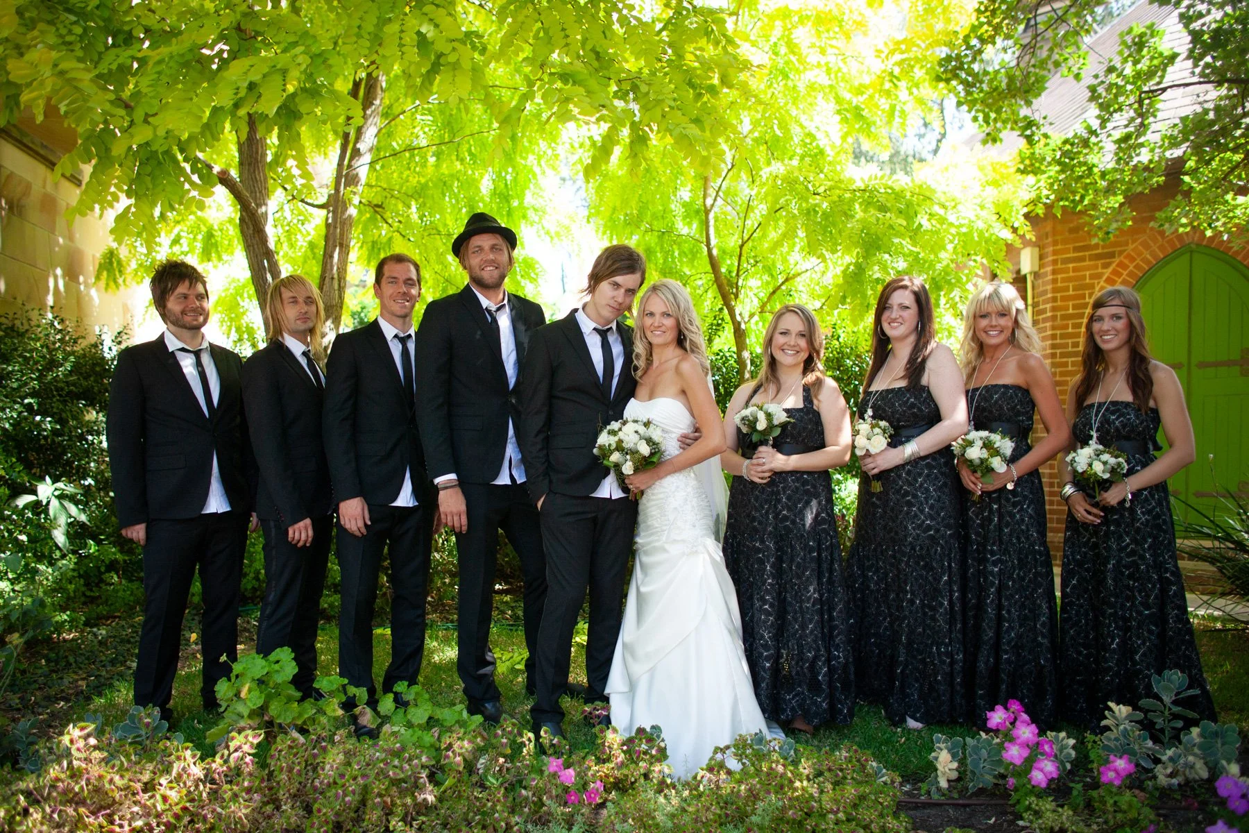 Bridal party portrait in garden at St Marks Darling Point