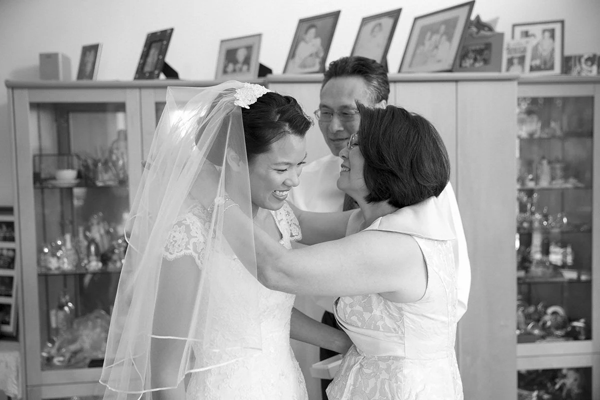 Bride and mother sharing veil moment Sydney wedding preparation black and white
