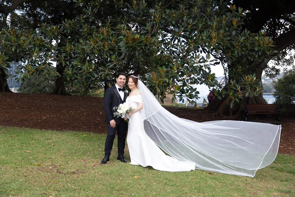 Couple at Observatory Hill with the Sydney Harbour Bridge behind them