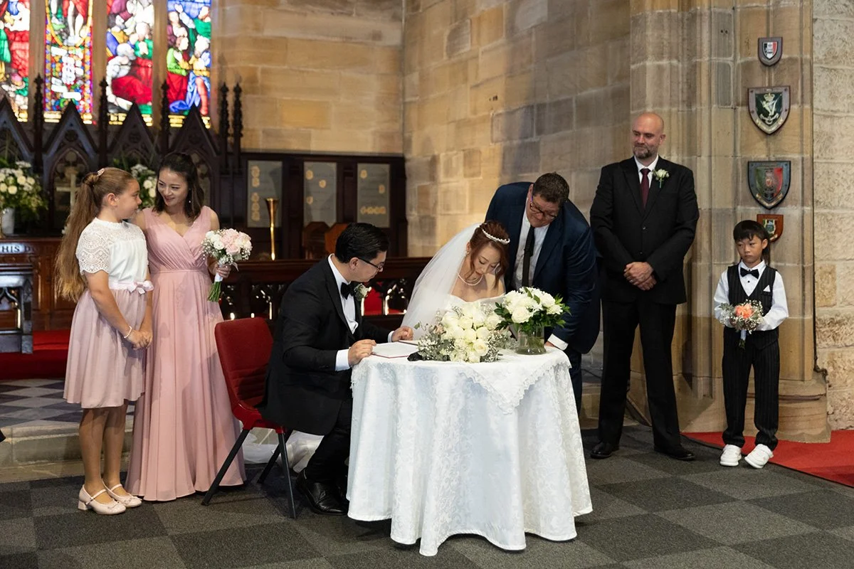 Ring exchange at the signing table, Garrison Church, Millers Point