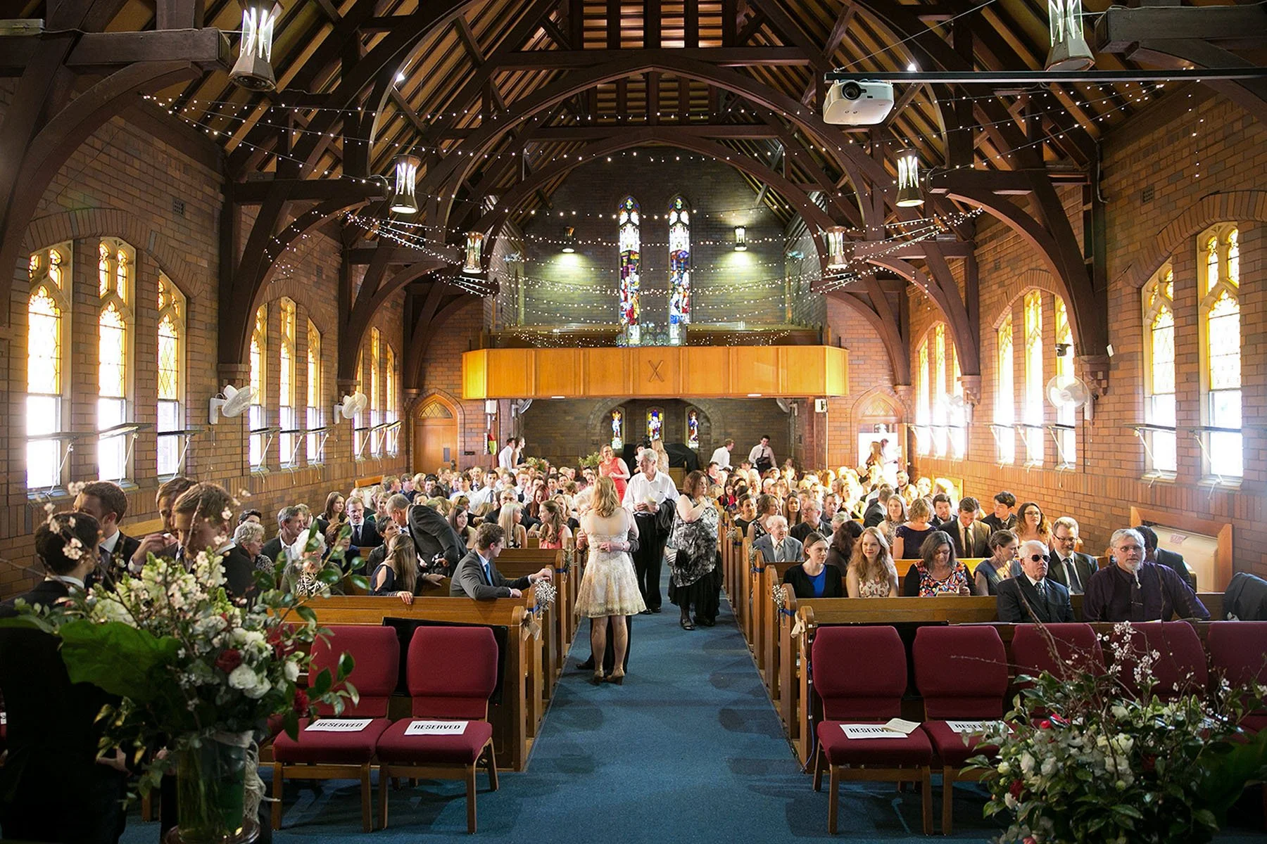 Guests await arrival of bride, view from altar a St Andrews Anglican Church Roseville