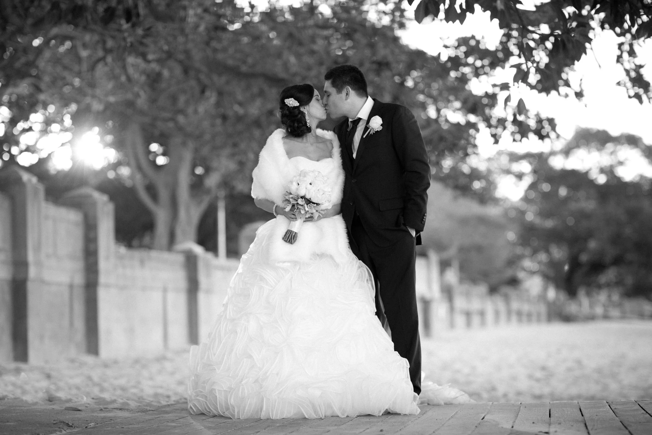 Black and white intimate kiss portrait at Balmoral Beach