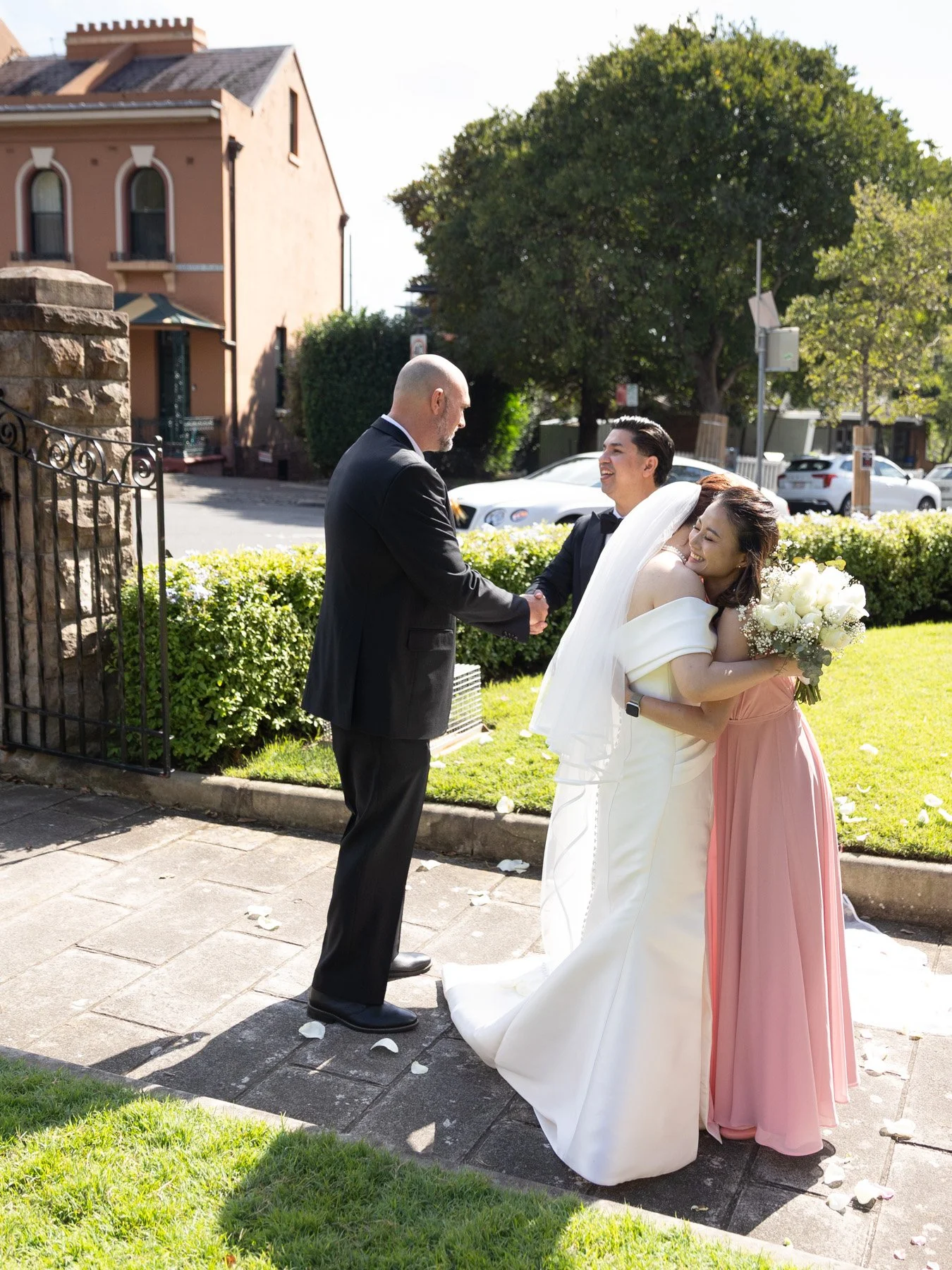 Congratulations from bridal party outside The Garrison Church, Millers Point wedding