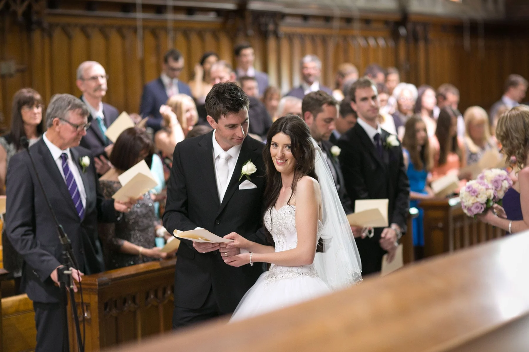 Singing a hymn, Shore School Chapel wedding ceremony, North Sydney