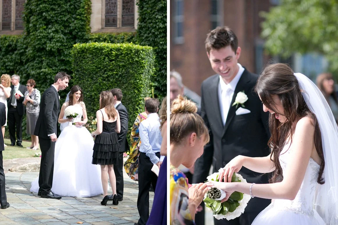 Bridal couple receiving congratulations of guests in Shore School Chapel grounds, North Sydney