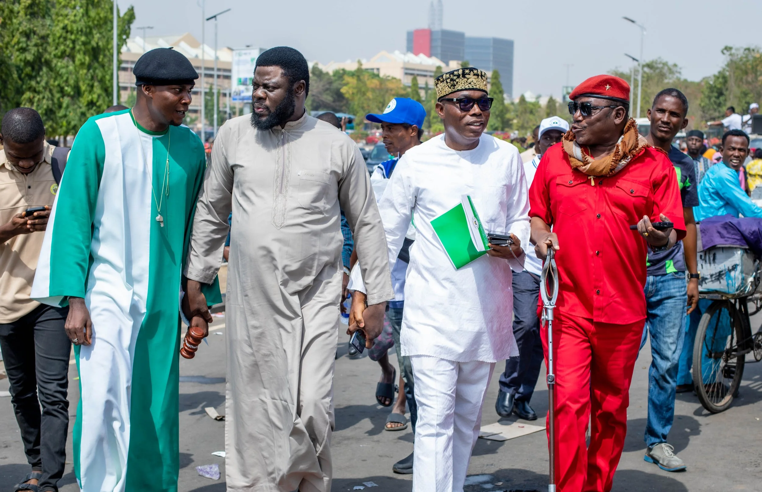 Prince Adewole Adebayo stands alongside Prophet Isa El-Buba (left) and former Minister of Youth and Sports, Solomon Dalung (right), in protest against the removal of the mandatory electronic transmission of voting results — a move that threatens the 