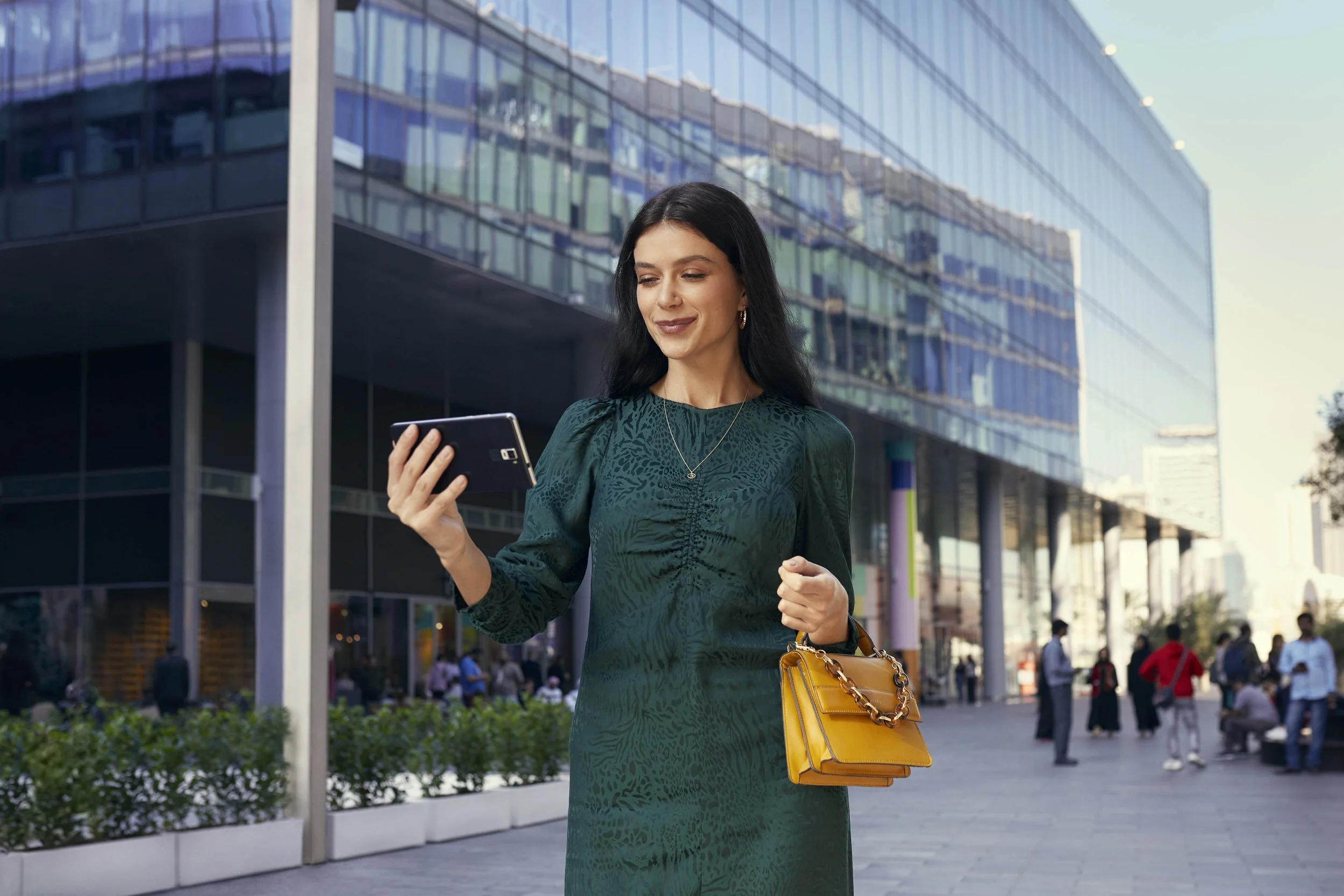 A young women walks down a shopping street in this image by leading advertising photographer Jon Enoch