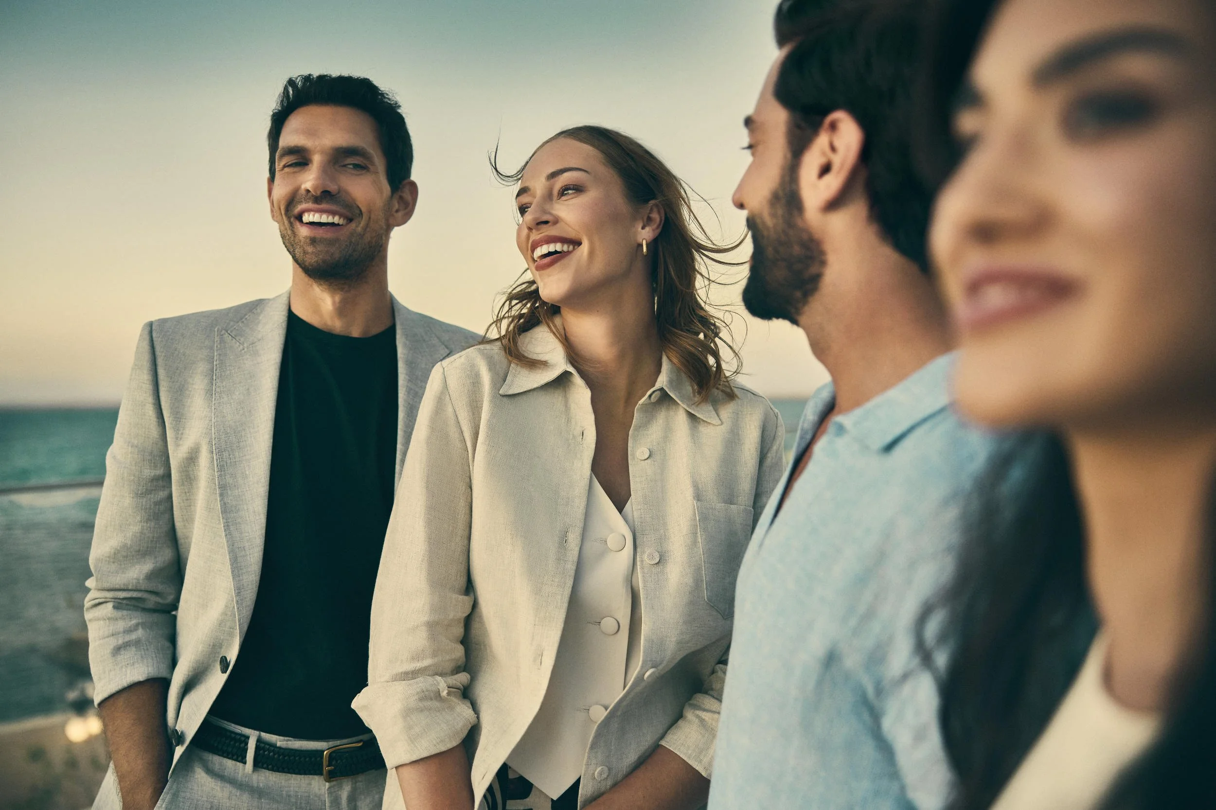 A group of friends enjoy themselves in this lifestyle image shot for the Saudi Neom project featuring their Red Sea luxury holiday island