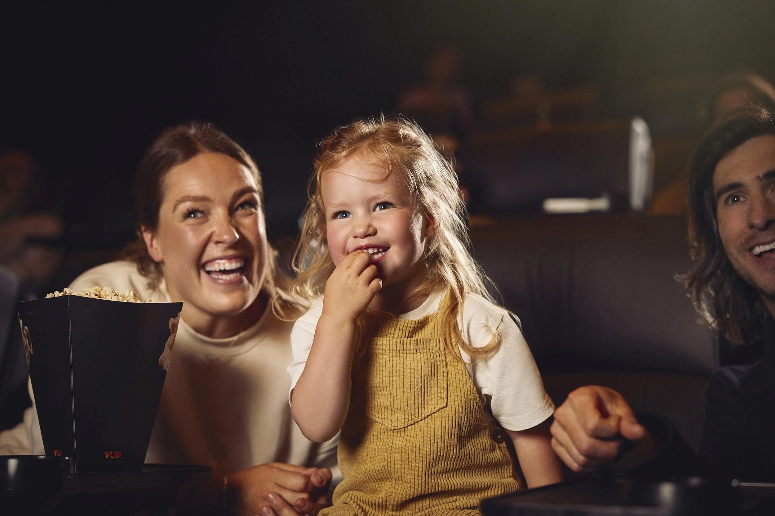 A monther holds her son in this lifestyle photography shot by London based photographer Jon Enoch for leading cinema chain Vue