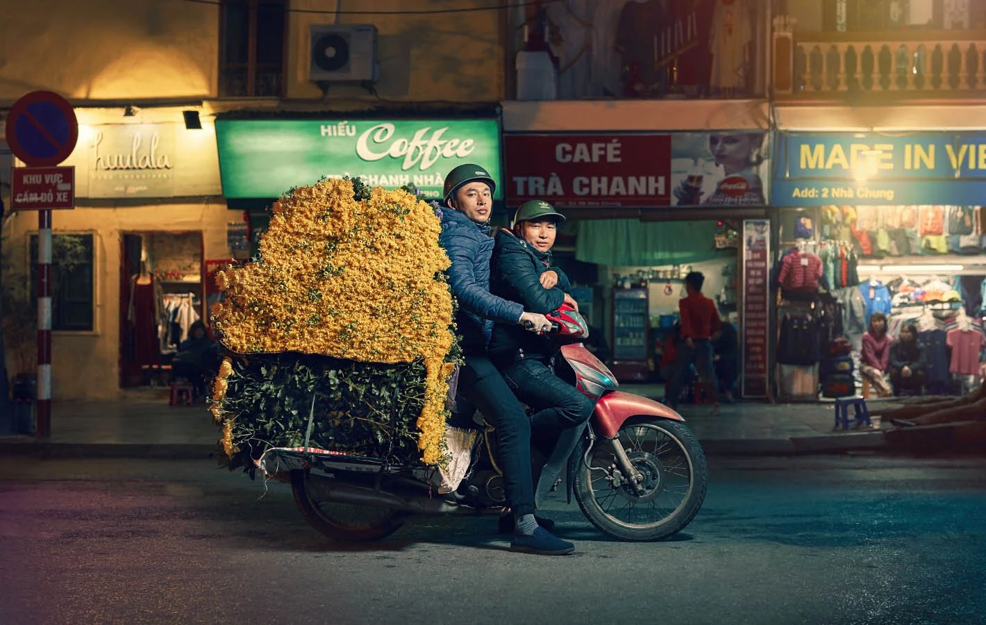 Advertising photographer Jon Enoch’s latest project ‘Bikes of Hanoi’ showing motorbikes carry goods around the city of Hanoi, Vietnam.