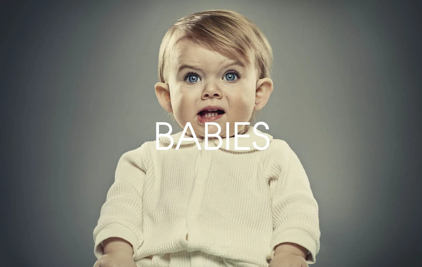 A series of dramatic studio portraits of babies by advertising photographer Jon Enoch