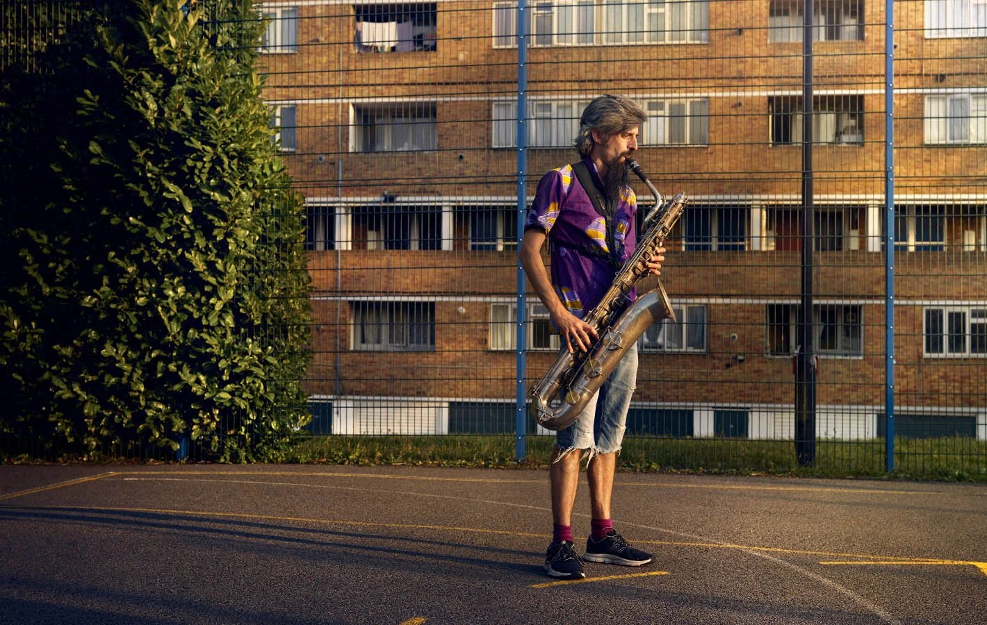 Rehearsal Room by Photographer Jon Enoch. Leroy Richardson and his bass trombone