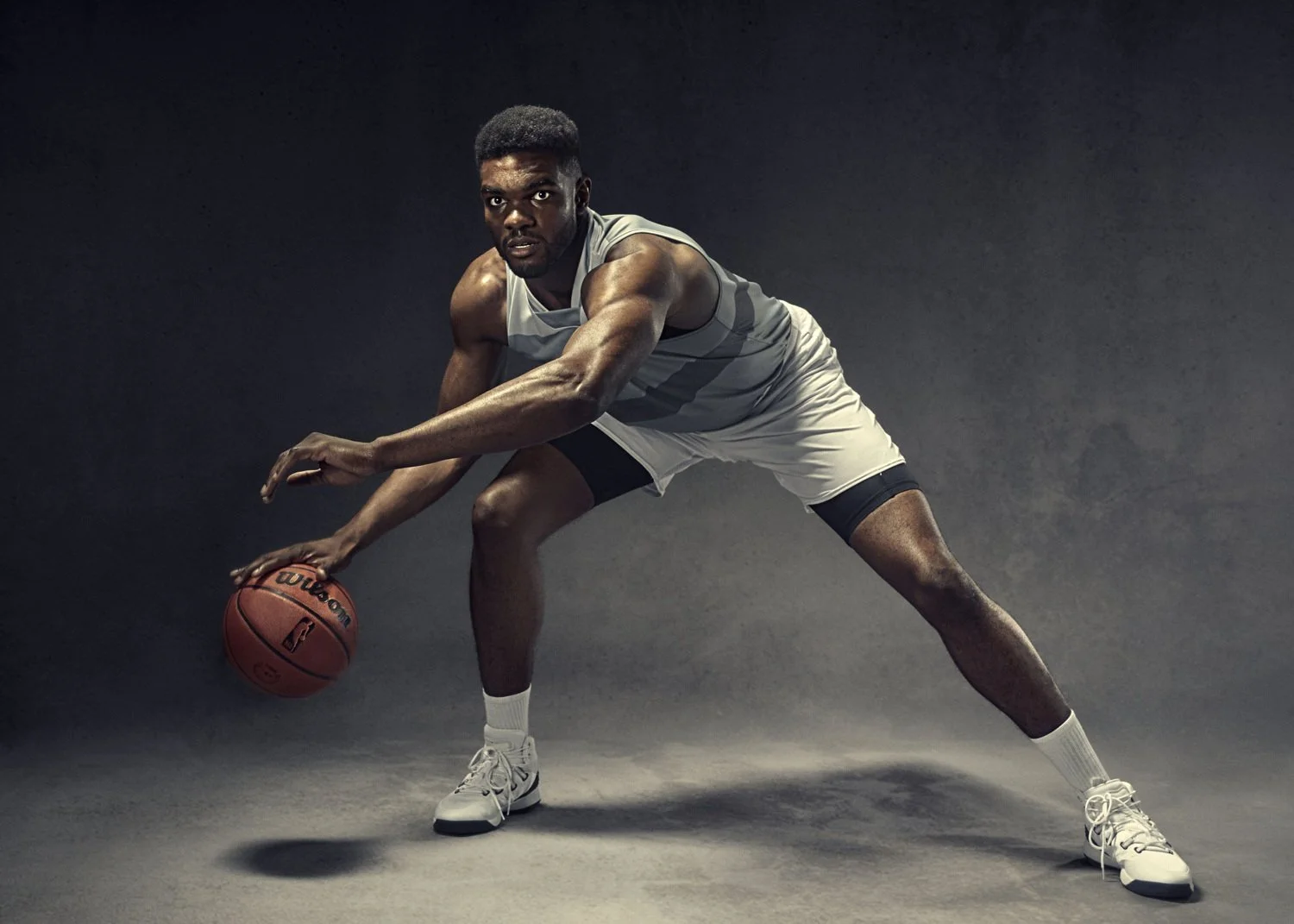 Sports photographer Jon Enoch captures a basketball player in action in this advertising iamge