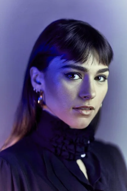 A studio portrait show with a very shallow depth of field to really draw the viewer into the subjects eyes.