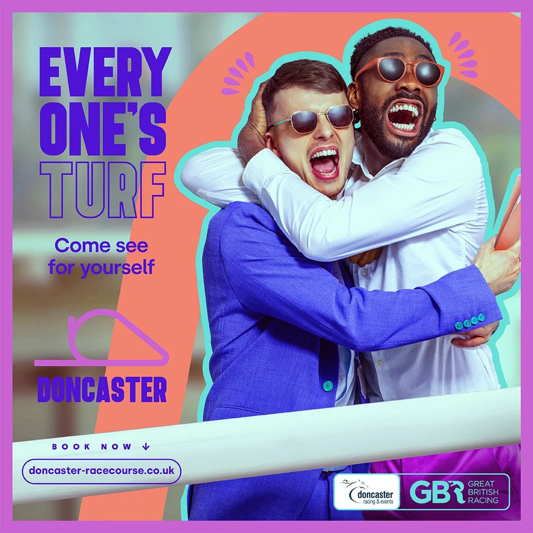 Two men celebrate in this advertising lifestyle image by photographer Jon Enoch.