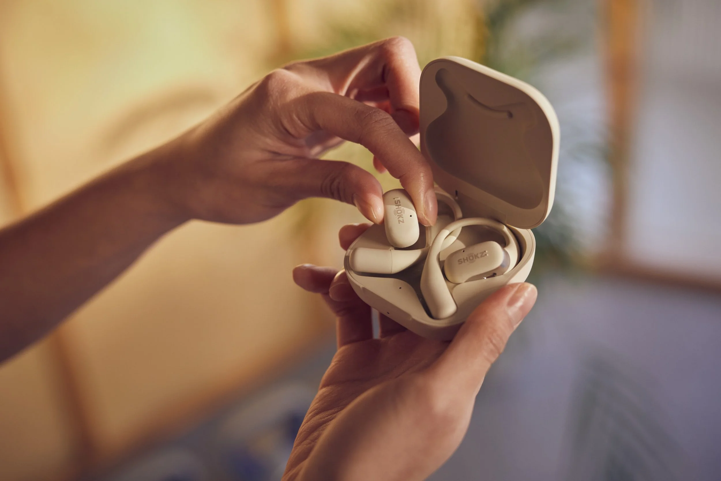 A close up lifestyle product image showing a pair on headphone and their case in this image by London based photographer Jon Enoch