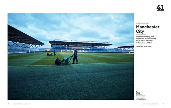 A grounds man mows the grass in this image from a Day in the life series at Manchester City Football Clubs youth Academy by sports advertising photographer Jon Enoch.