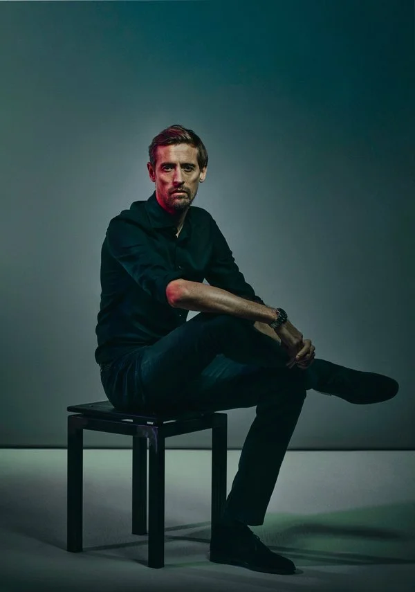 Portait photographer Jon Enoch photographs Peter Crouch.