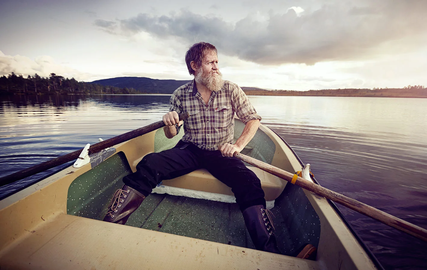 Fisherman in Norway in his rowing boat - Lifestyle photography by London based lifestyle photographer Jon Enoch  (Copy)