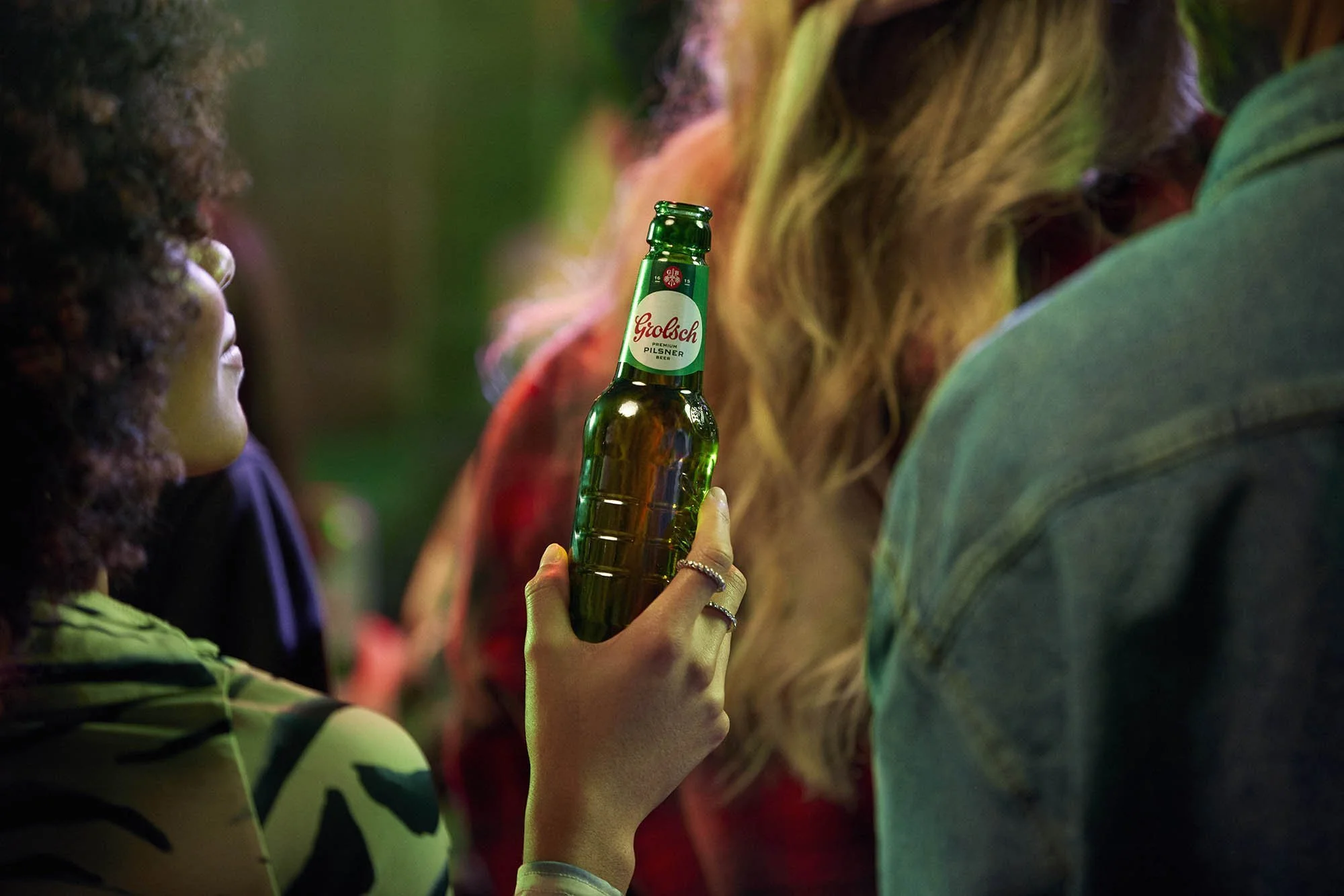 A close up of a bottle at a music venue in this lifestyle image by Jon Enoch