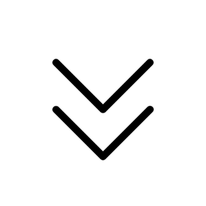 Black and white image of a smiling, cartoonish face with open eyes and a wide, toothy grin.