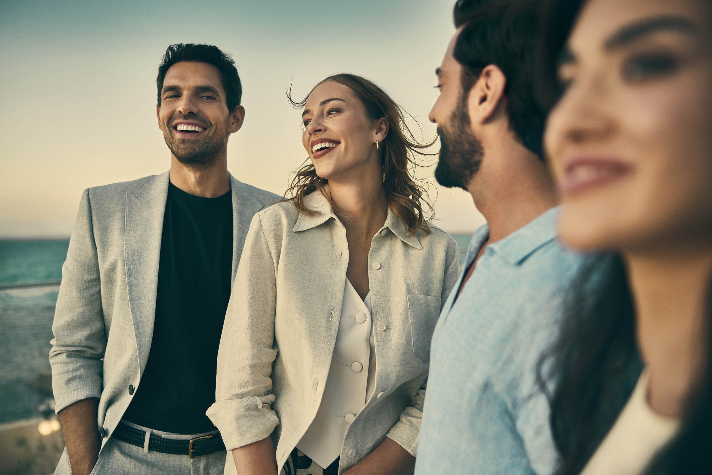 Shared moments in a lifestyle advertising campaign, friends enjoying a sunset together