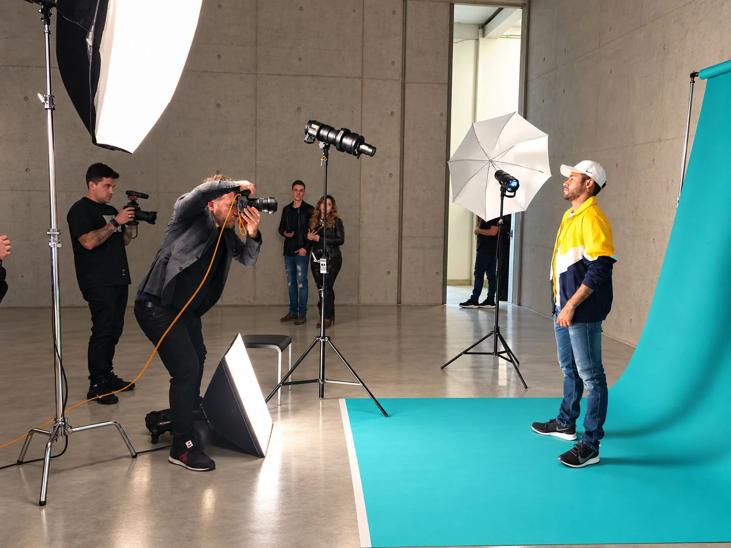 Jon Enoch photographing Neymar during a studio sports portrait session