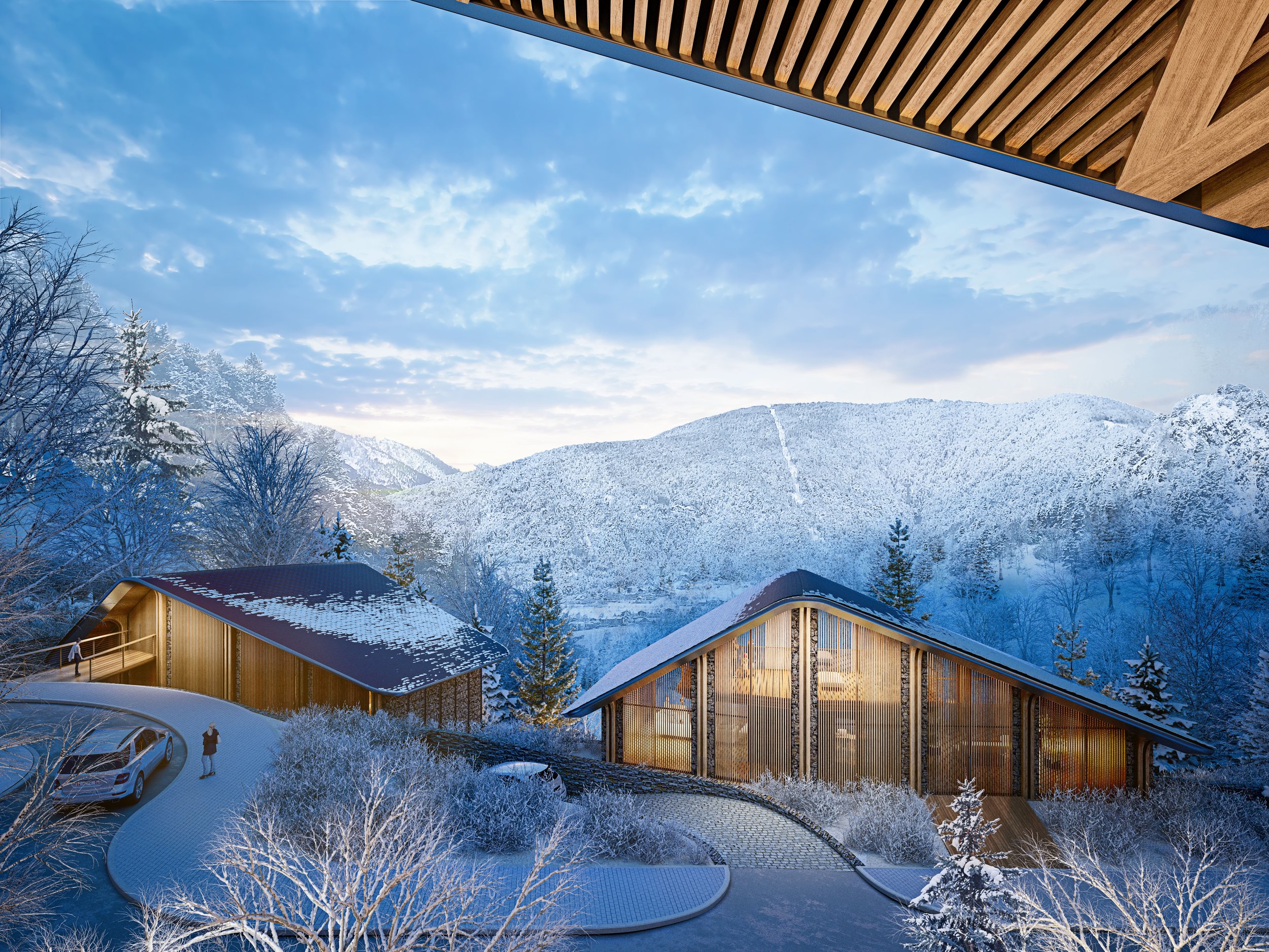 Vista panorámica de casas de madera con techos cubiertos de nieve en un paisaje montañoso con árboles y cielo nublado