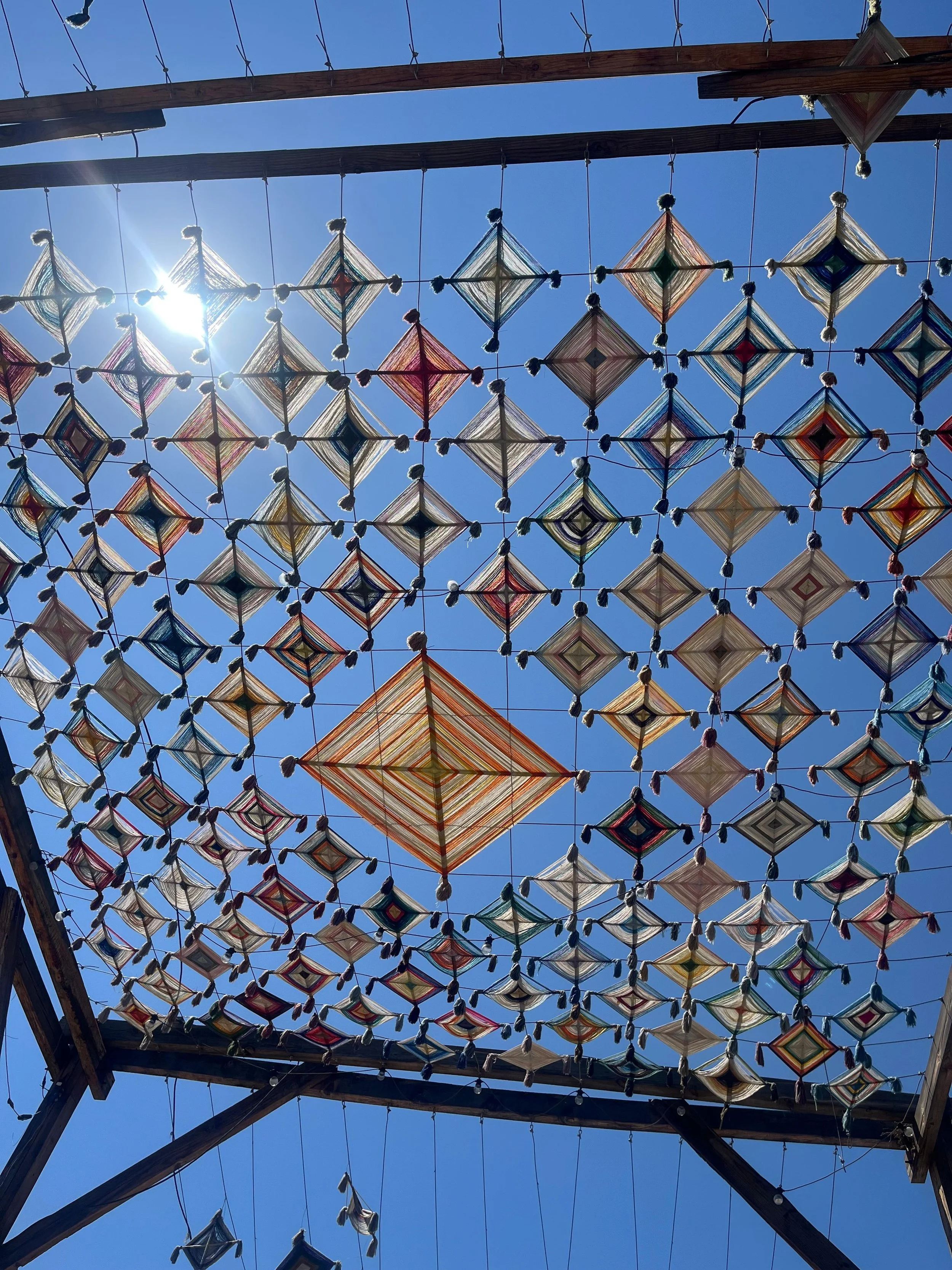 Ojos de Dios sun shade installation in guadalajara's city center pedestrian area 