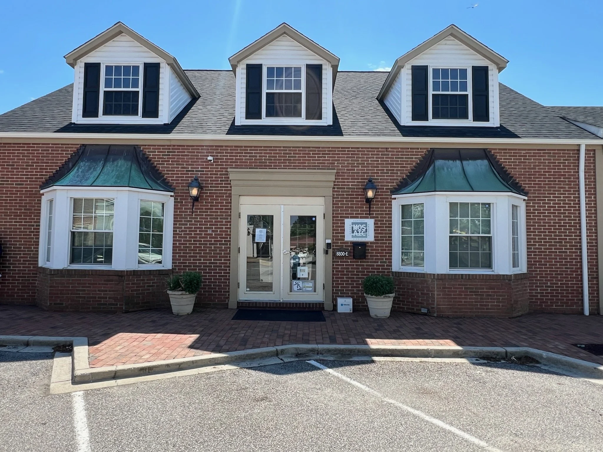 Front view of Mosaic Virginia Alexandria office at 8800-E Pear Tree Village, Alexandria, VA 22309 (near Fort Belvoir, Hybla Valley, Mt Vernon, Lorton, Kingstowne, Occoquan, VA)