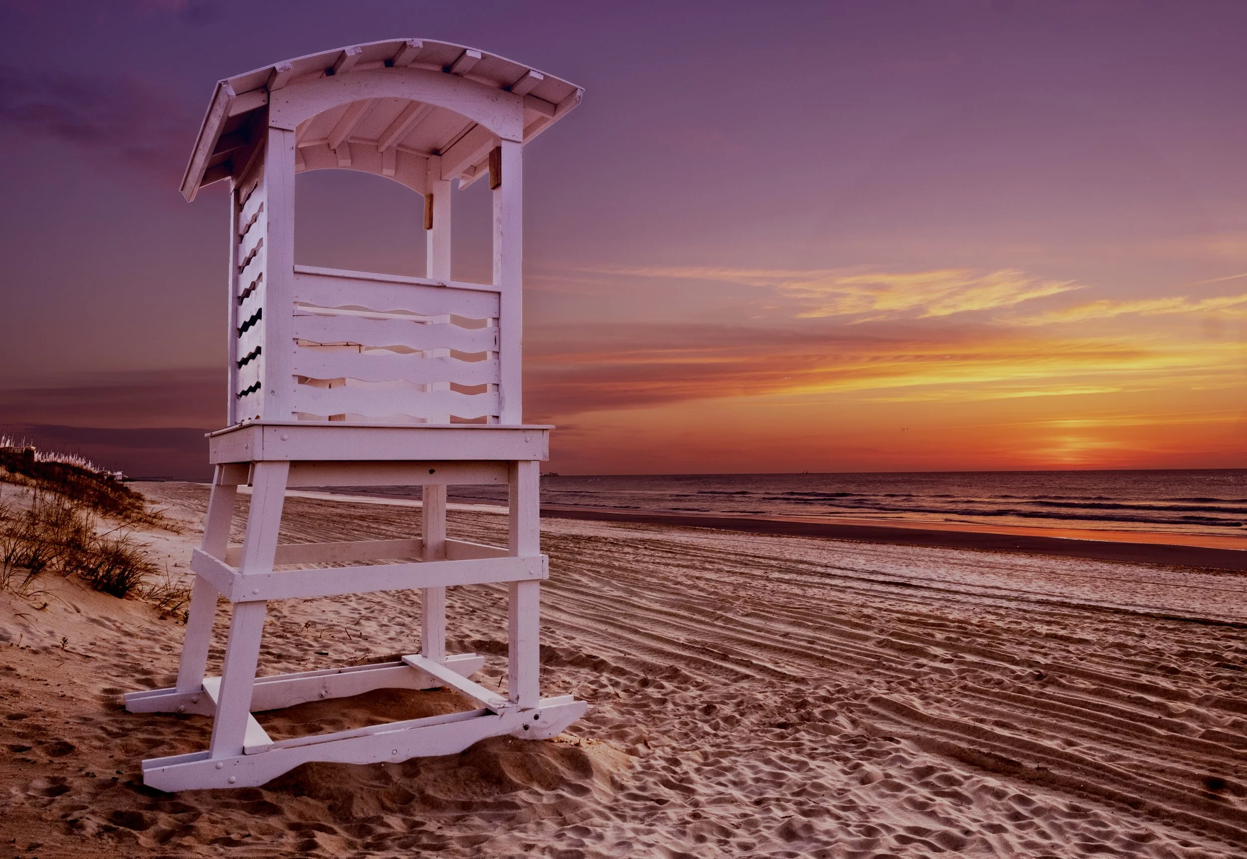 Lifeguard hut looking over sunset at South Beach Miami Florida