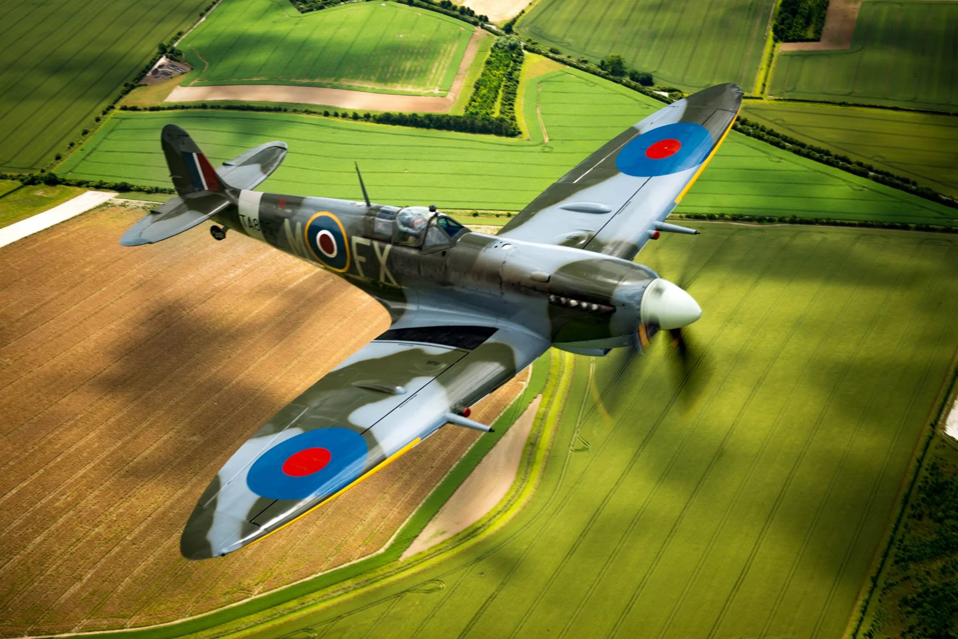 Spitfire Mark 9 taken from above whilst flying in a Dragon Rapide biplane. Taken with my Nikon D810
