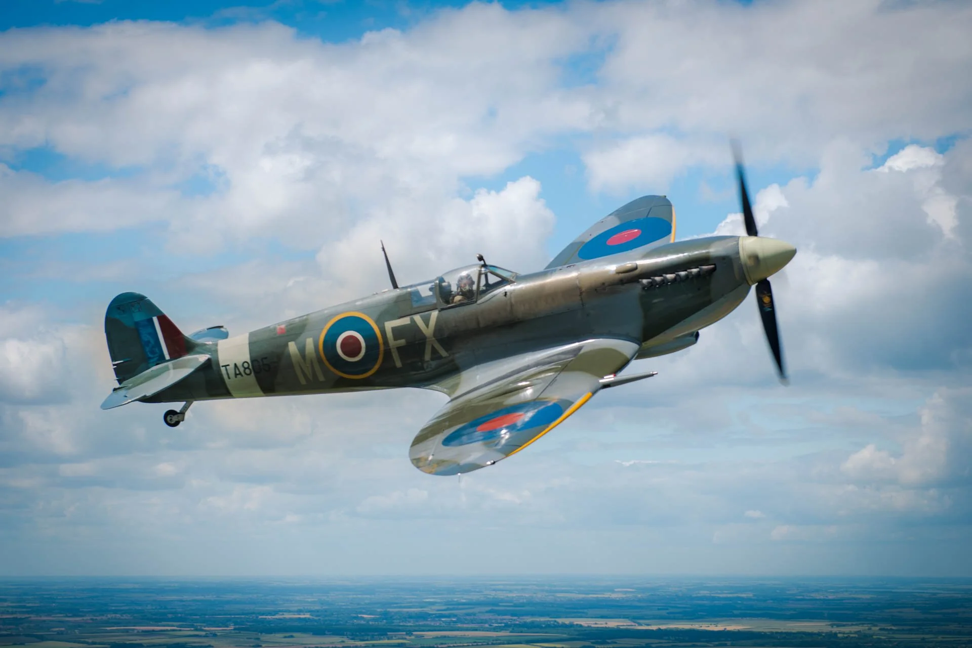 Spitfire Mark 9 taken whilst flying alongside in a Dragon Rapide biplane. Taken with my Nikon D810