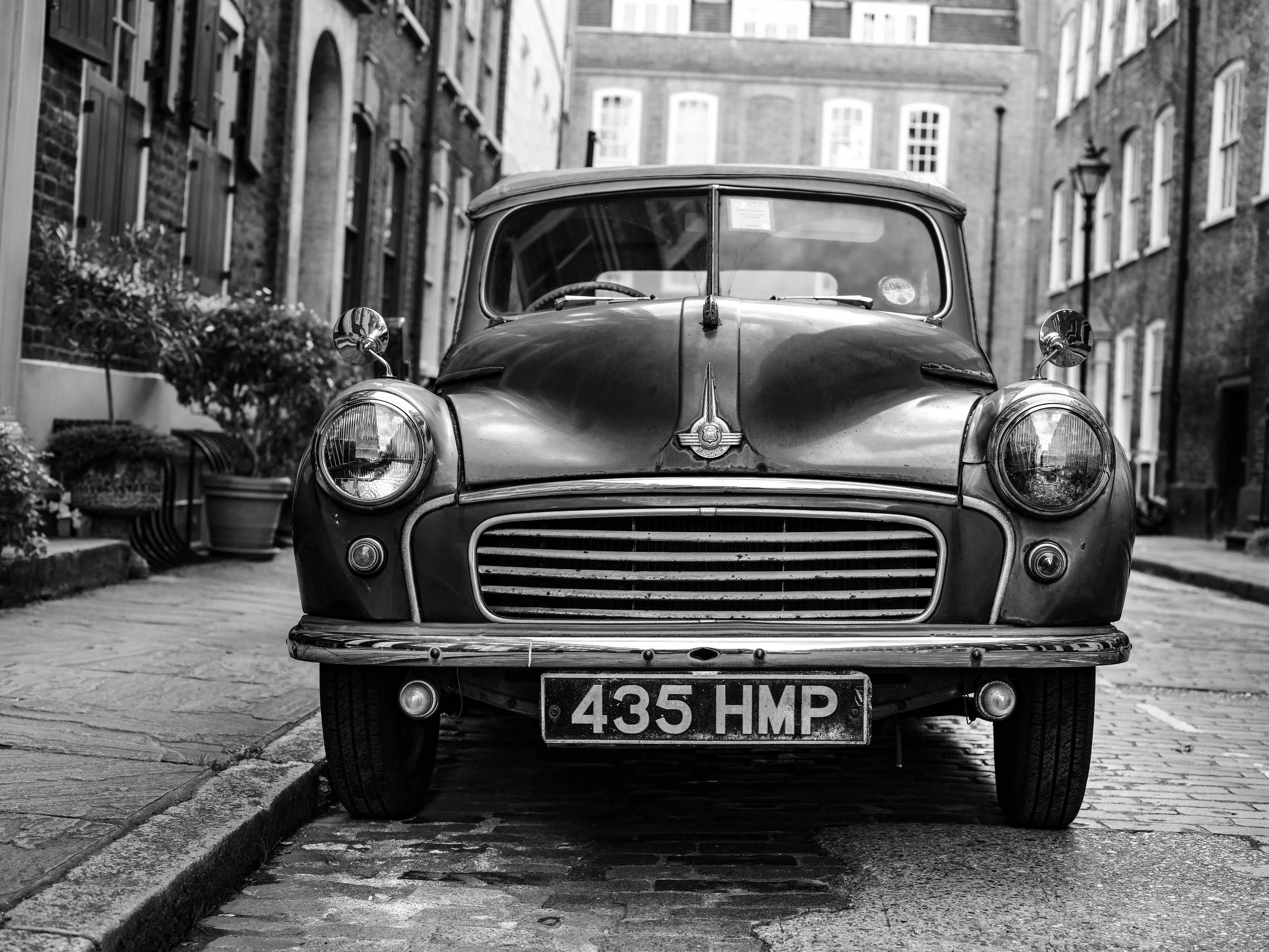 A Morris Minor parked up in the streets of East London