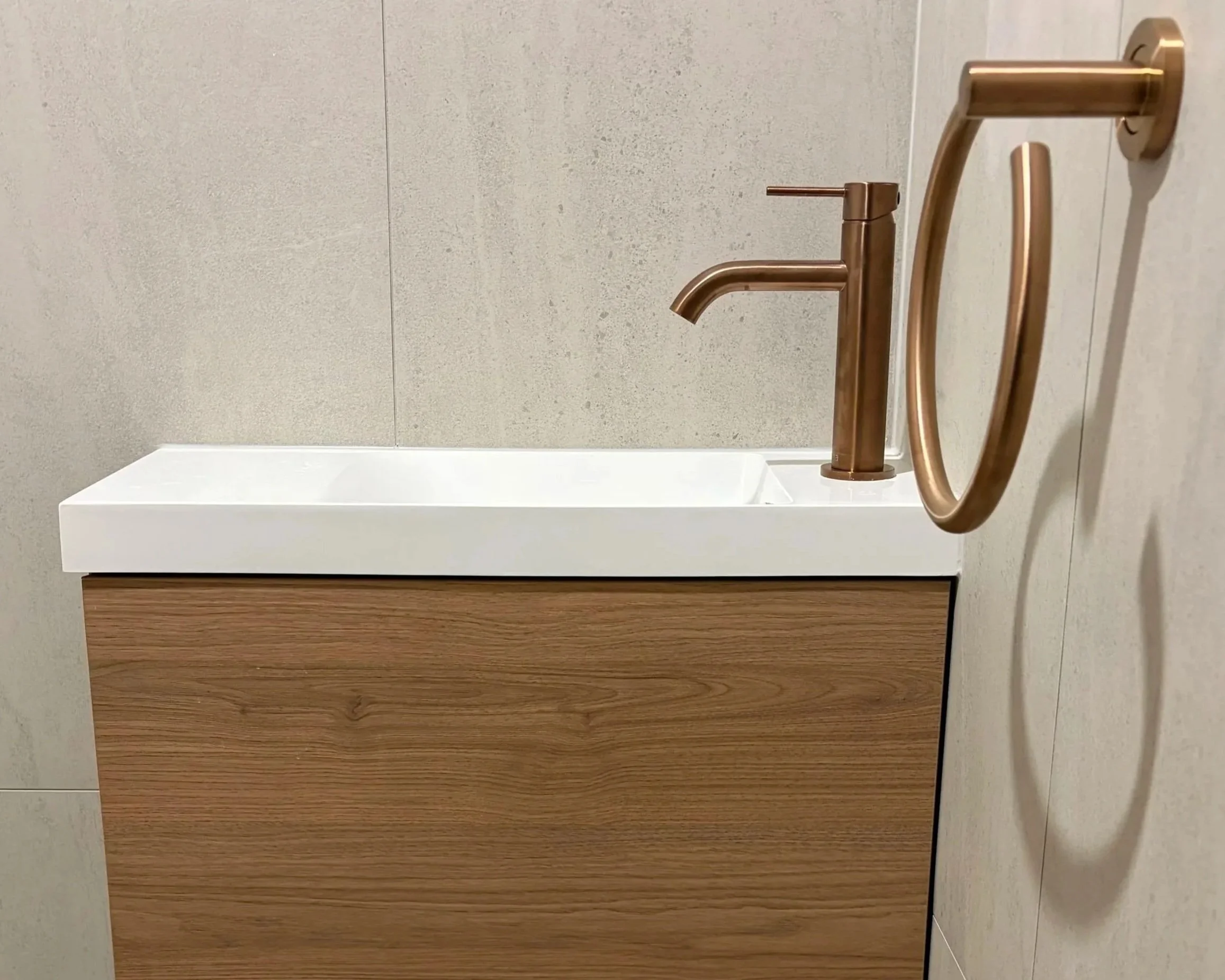 Bathroom vanity installation by Graziani Tiling & Renovations (GTR Renovations) in Perth, highlighting detailed tiling work, timber cabinetry, and premium tapware.