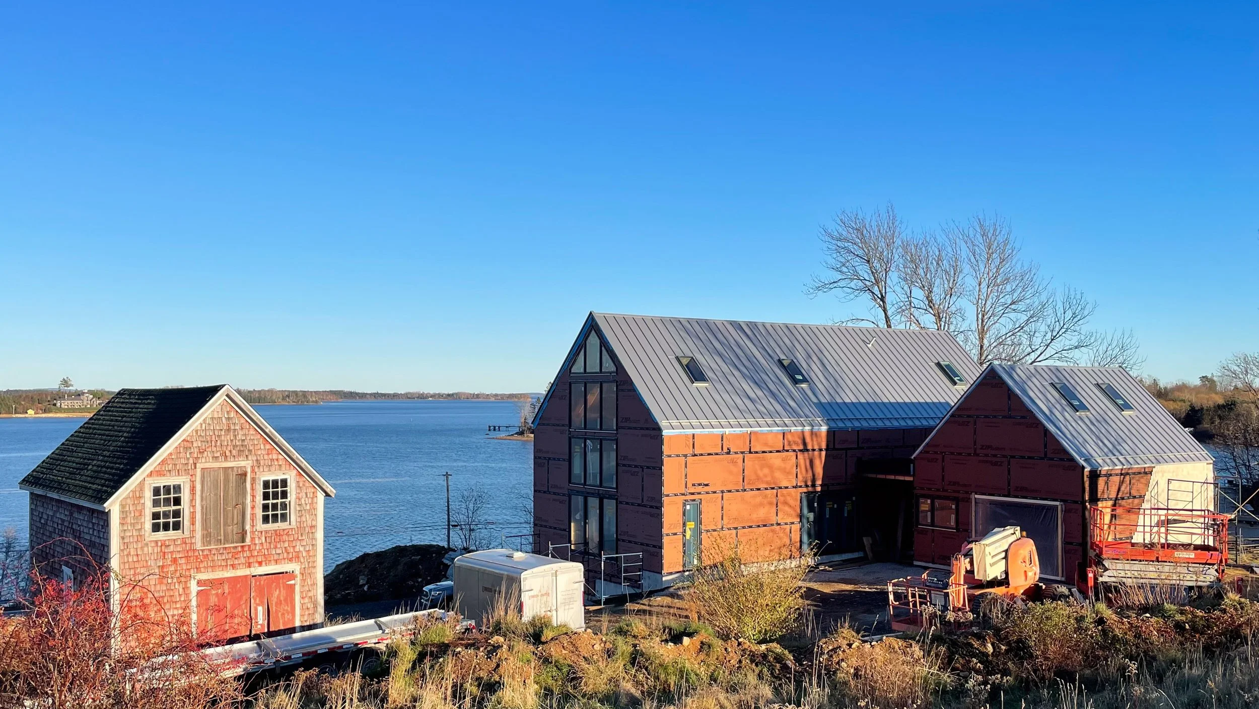 The Barn Metal roof Rubarth Builders Mader’s Cove overlooking the clear blue bay