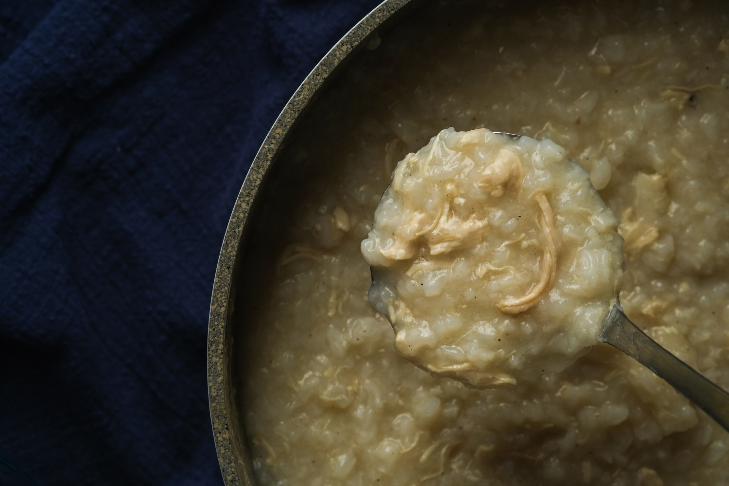 A warm bowl of postpartum congee prepared for a new mother